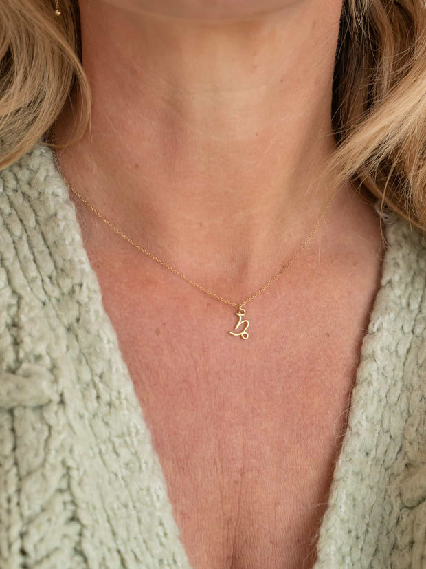 Capricorn Zodiac Pendant Necklace ethical & sustainable jewelry made from recycled 14k yellow gold